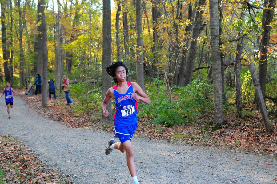 Manuel Legaspi Jr. paces himself during a cross country run. The team had a successful, and Coach Puffett is pushing the runners to be the best they can be in the future through strict training plan according today of the week.
