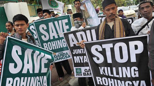 People protesting the horrific actions on Rohingyan refugees.
