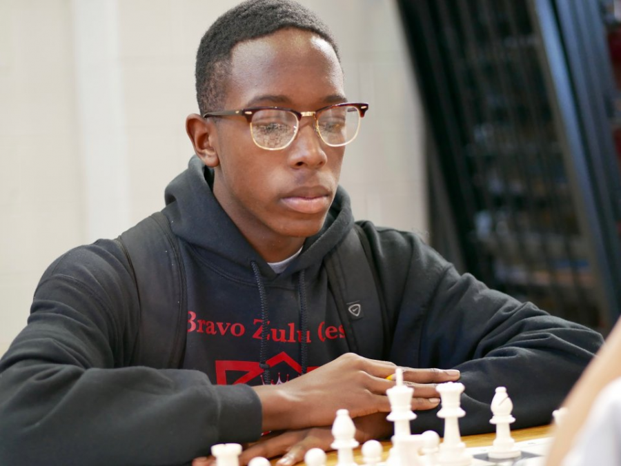 Zahir Muhammad concentrates on his chess match.