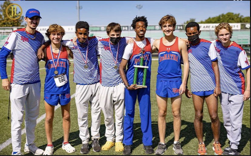 %C2%A0Tariq+Lewis+22+%28center+holding+trophy%29+pictured+at+Arundel+High+School+with+members+of+DeMathas+Cross+Country+varsity+squad.+Photo+credit+to+%40demathaxc+on+Instagram+and+Antoine+Keels+03.