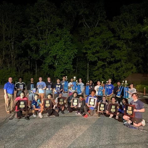 Proud DeMatha students display the trophies and awards they won at the Worldstrides Band Competition. Credit: @demathacatholic