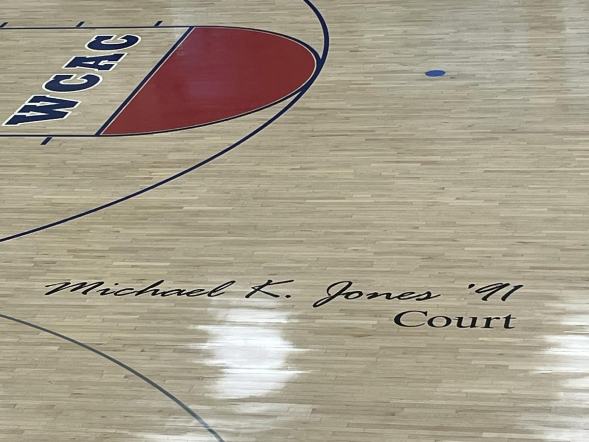DeMatha+officially+named+its+basketball+court+in+honor+of+former+coach+Mike+Jones+on+Dec.+15.+Jones%2C+who+coached+the+Stags+from+2002-21%2C+led+his+alma+mater+to+eight+conference+championships+and+mentored+several+NBA+players.+