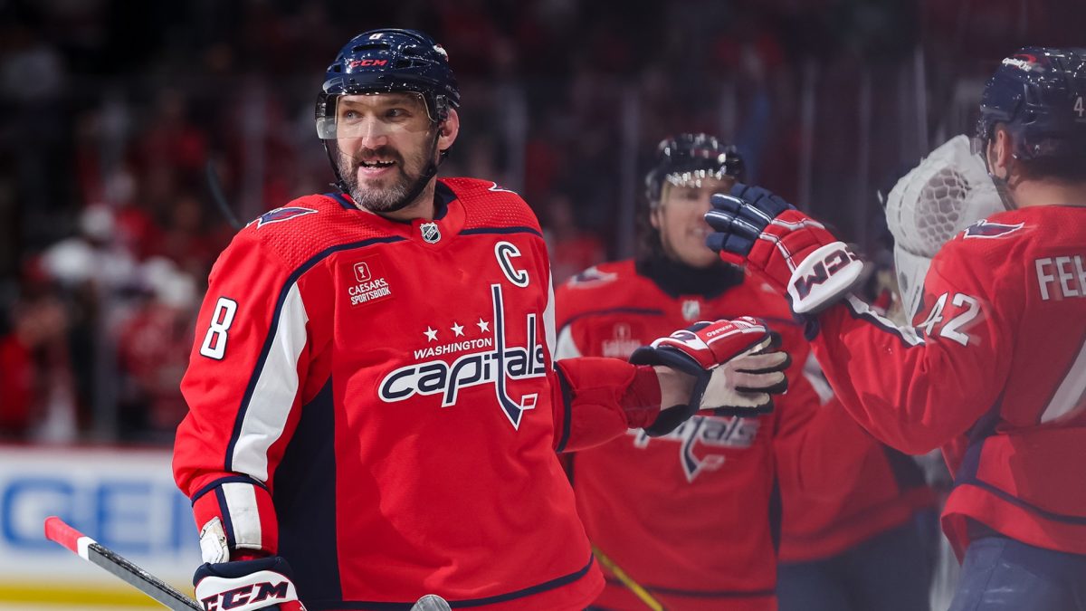 WASHINGTON, DC - MARCH 24: Alex Ovechkin #8 of the Washington Capitals celebrates with teammates after scoring a goal against the Winnipeg Jets during the third period of the game at Capital One Arena on March 24, 2024 in Washington, DC. (Photo by Scott Taetsch/Getty Images)