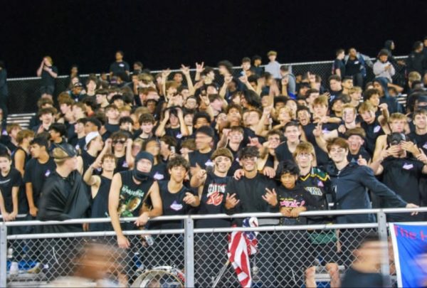Shane Bonnani is pictured in the ski mask on the left and Mikey Griffiths is pictured on the far front right.