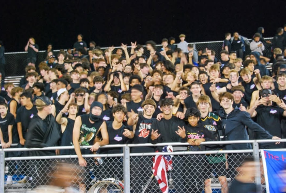 Shane Bonnani is pictured in the ski mask on the left and Mikey Griffiths is pictured on the far front right.