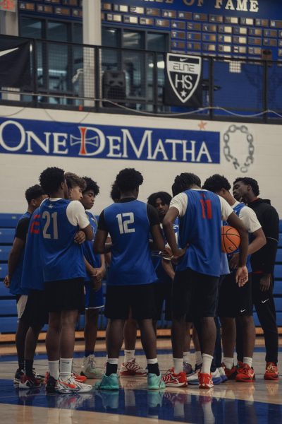 Stags huddle up during their summer league play.